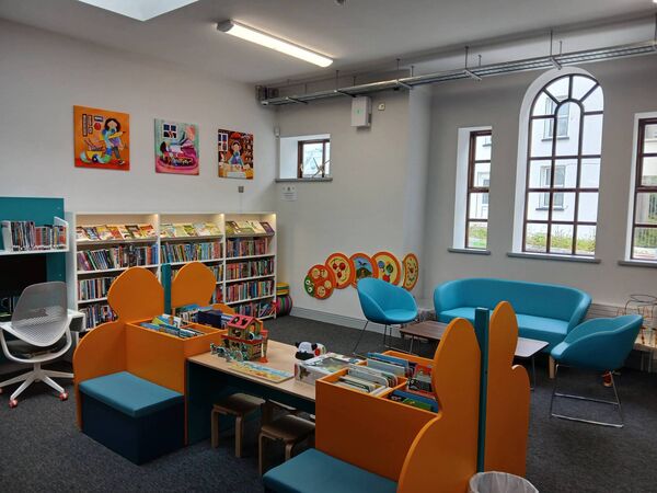 The library now includes a large, dedicated children’s section with seating areas. The library now includes a large, dedicated children’s section with seating areas.