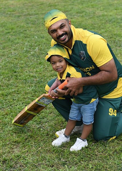 Ethan Abram with father George from Castlerea at Roscommon Town Cricket Club's first-ever cricket tournament in the town. Pic: Gerard O'Loughlin 