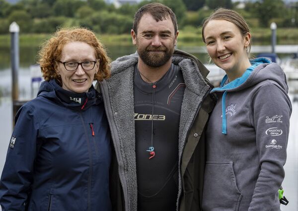 Paul Little with his swim coach Dympna Kelly and wife Hazel. Pic: Mark Kelly