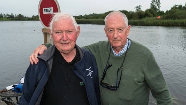 <p>Carrick Rowing Club trustee Gabriel Cox and long-time visitor Norman Hamill from Coleraine, Co Derry, were on duty at the Regatta finish line. Pic: Gerry Faughnan</p>