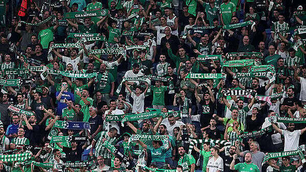 Israeli football fans cause outrage in Poland with 'murderers' banner
