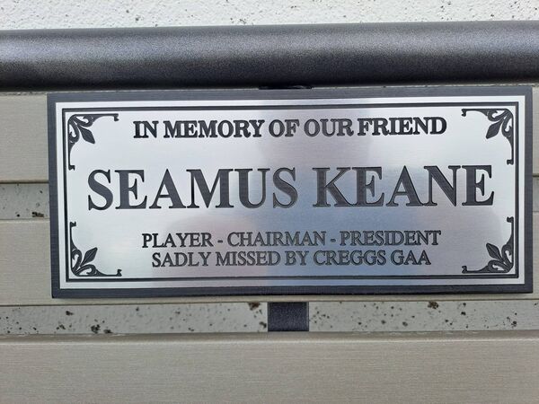 The plaque on the memorial bench. The plaque on the memorial bench.