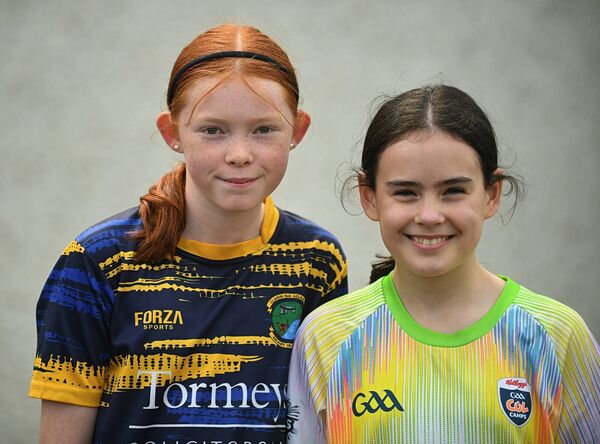 Katie Durney and Aoife Fallon supporting Clann na nGael during their senior ladies' football championship game against St. Brigid's in Johnstown on Sunday last. Picture: Gerard O'Loughlin Katie Durney and Aoife Fallon supporting Clann na nGael during their senior ladies' football championship game against St. Brigid's in Johnstown on Sunday last. Picture: Gerard O'Loughlin