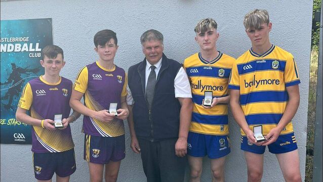 <p>Micheál Greene and John Reilly pictured alongside Wexford's Johnny and Jerry Cash after their U-16 All Ireland Softball Doubles final </p>