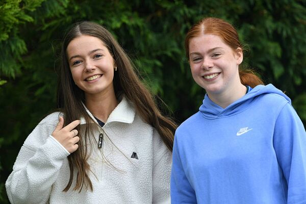 Emma Nolan and Kate O’Connor supporting St. Brigid's during their senior ladies' football championship match against Éire Óg in Kiltoom. Picture: Gerard O'Loughlin
