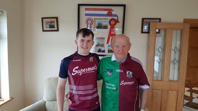 <p>The late Paddy Flynn Snr with his grandson Michael who won an All-Ireland minor hurling medal with Galway in 2018. </p>