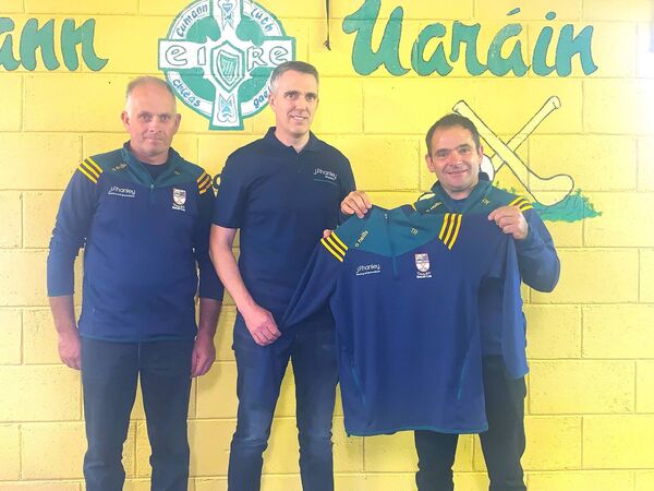 Patrick Hanley, on behalf of John F. Hanley and Groundcare, presents half zip tops to Oran Hurling Chairperson Damien Kenny (right) and Treasurer, Tim Healy. Patrick Hanley, on behalf of John F. Hanley and Groundcare, presents half zip tops to Oran Hurling Chairperson Damien Kenny (right) and Treasurer, Tim Healy.