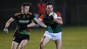 <p>Shane O'Malley and Brian Stack in action for Michael Glaveys and St. Brigid's respectively during the clubs' recent senior football championship game in Lisnamult. Picture: Gerard O'Loughlin</p>