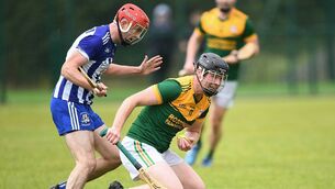 <p>Oran's Thomas Fallon grabs possession ahead of St. Dominic's defender Jason Martin during Sunday afternoon's senior hurling championship semi-final at Ballyforan. Picture: Gerard O'Loughlin</p>