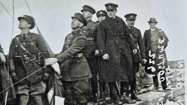 <p>Comdt Gen Sean MacEoin raising the Tricolor over Athlone Castle on February 28th, 1922 after taking over Custume Barracks and the castle from the British. The photograph will be among a forthcoming display in the officers’ mess at the barracks.</p>