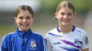 <p>St. Dominic's supporters, Mia Connaughton and Violet Wright-Looby, will be hoping that their side can secure their senior status against Western Gaels on Friday evening. Picture: Gerard O'Loughlin</p>