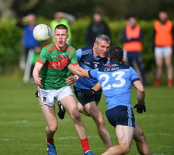 IN CONTROL: St. Michael's centre-back, Ruadhan Henry, gathers possession ahead of Kilmore's Jack Sharkey (number 23) and Dermot Foley during Sunday afternoon's intermediate football championship quarter-final at Tom Collins Park, Croghan. Pictures: Gerard O'Loughlin