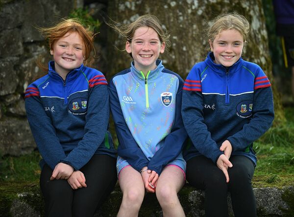 Neela Casey, Saoirse Cox and Lily Harte supporting St. Michael's during last weekend's intermediate football quarter-final against Kilmore at Tom Collins Park, Croghan. 