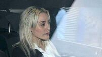 Woman (45) appears in court charged with murder of two men in Dublin
