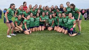 <p>The St. Brigid's senior football panel with the Marie McAleer Cup after becoming Roscommon senior ladies' football champions on Saturday afternoon. </p>