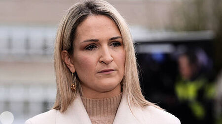 Connolly must publish emails querying vetting of former inmate, McEntee says