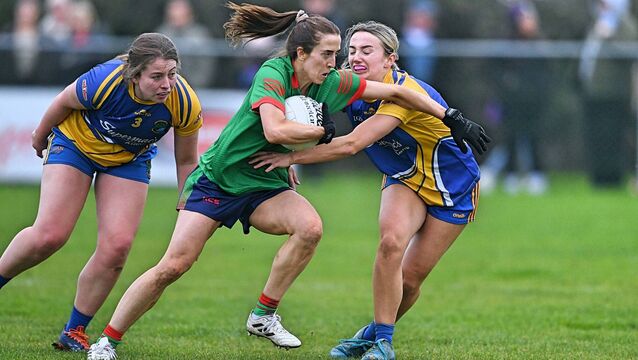 <p>St. Brigid's forward Áine O'Brien is determined to take the most direct route towards goal during last Saturday's county senior ladies' football final against Clann na nGael in Ballyleague. Picture: Gerard O'Loughlin</p>