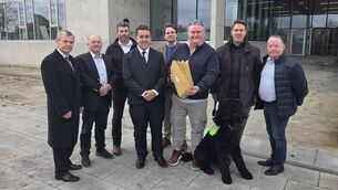 <p>Members of Ballyfeeney Action Group and Ballyfeeney NS representatives handing the objections into the council this morning. </p>
