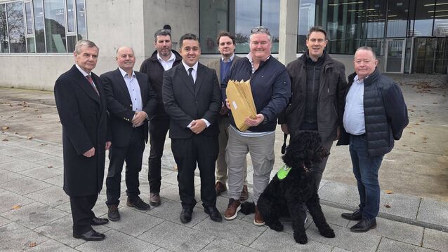 <p>Members of Ballyfeeney Action Group and Ballyfeeney NS representatives handing the objections into the council this morning. </p>