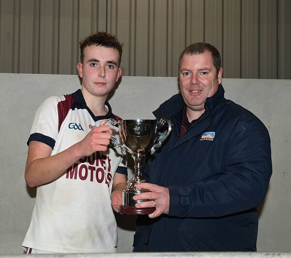 Boyle U-14 captain, Rory O'Shaughnessy, accepts the cup from Tony Christie, Roscommon GAA Assistant Treasurer, following last Thursday week's thrilling Division One football final against St. Ciaran's. Picture: Gerard O'Loughlin Boyle U-14 captain, Rory O'Shaughnessy, accepts the cup from Tony Christie, Roscommon GAA Assistant Treasurer, following last Thursday week's thrilling Division One football final against St. Ciaran's. Picture: Gerard O'Loughlin