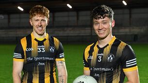 <p>Diarmuid McGann and Shane McGinley are celebrating a county intermediate football championship title with Strokestown following their victory against Éire Óg in Kiltoom on Sunday afternoon. Picture: Gerard O'Loughlin</p>