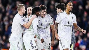 Kylian Mbappe nets late winner as Real Madrid beat nine-man Getafe to go top