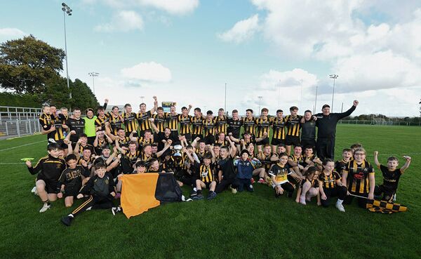 TIDY 'TOWN'S TRIUMPH: The Strokestown intermediate football panel, management and supporters celebrate their side's championship success against Éire Óg in Kiltoom on Sunday last. Pictures: Gerard O'Loughlin TIDY 'TOWN'S TRIUMPH: The Strokestown intermediate football panel, management and supporters celebrate their side's championship success against Éire Óg in Kiltoom on Sunday last. Pictures: Gerard O'Loughlin