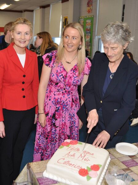 Catherine Connolly cutting a cake welcoming her to St. Anne’s school in Castlerea today. Also pictured is Deputy Claire Kerrane and school principal Jacinta Ní Chonghaile. Pic: Liam Reynolds Catherine Connolly cutting a cake welcoming her to St. Anne’s school in Castlerea today. Also pictured is Deputy Claire Kerrane and school principal Jacinta Ní Chonghaile. Pic: Liam Reynolds