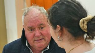 <p>Roscommon Herald reporter Molly O'Reilly has a word with Eugene Murphy. Pic: Gerard O'Loughlin</p>