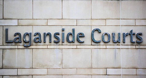 Four refused bail after appearing in Belfast court charged over tourist attack