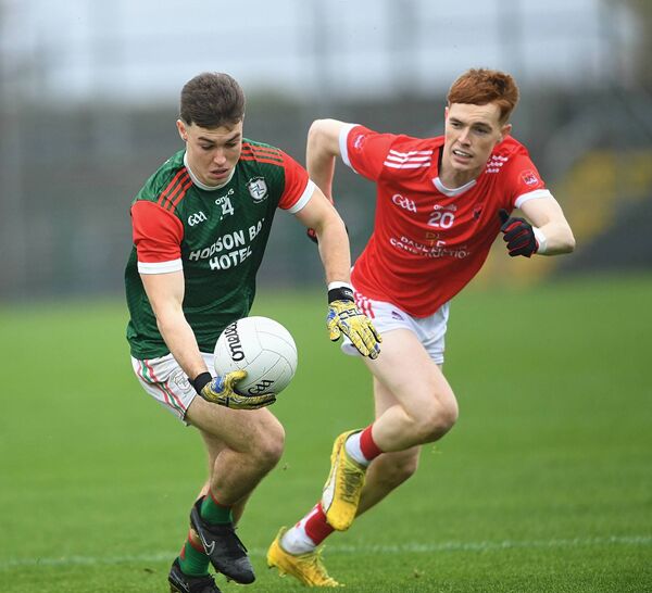 Bobby Nugent keeps his eye on the ball as Adam McGreal keeps tabs on the St. Brigid's forward during last Sunday's drawn Roscommon SFC final at King and Moffatt Dr. Hyde Park. Picture: Gerard O'Loughlin Bobby Nugent keeps his eye on the ball as Adam McGreal keeps tabs on the St. Brigid's forward during last Sunday's drawn Roscommon SFC final at King and Moffatt Dr. Hyde Park. Picture: Gerard O'Loughlin