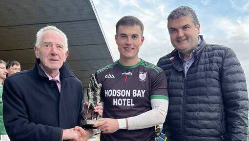 St. Brigid's goalkeeper, Conor Carroll, receives his Player of the Match award from John Corcoran, sponsor, and Brian Carroll, Roscommon GAA Chairperson. Picture: Roscommon GAA St. Brigid's goalkeeper, Conor Carroll, receives his Player of the Match award from John Corcoran, sponsor, and Brian Carroll, Roscommon GAA Chairperson. Picture: Roscommon GAA