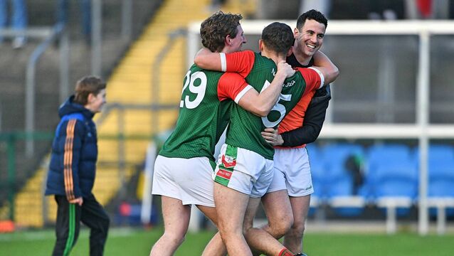 <p>WE DID IT: St. Brigid's players celebrate the club's 19th Roscommon senior football championship success following Saturday's replay against Pádraig Pearses at King and Moffatt Dr. Hyde Park. </p>