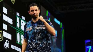 Luke Humphries hits nine-darter to beat Michael Smith at Grand Slam of Darts