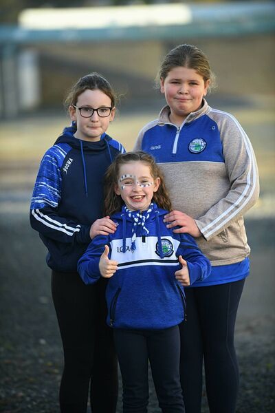 Blake Tarmey, Alison Smyth and Ciara Hussey supporting the St. Croan's junior footballers during the club's Connacht quarter-final against Cloonacool on Sunday last. Picture: Gerard O'Louglin