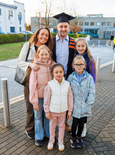 Vinny Costello, from Taughmaconnell on his gradauation day with his wife and four daughters. Vinny Costello, from Taughmaconnell on his gradauation day with his wife and four daughters.