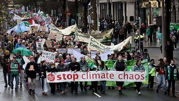 Hundreds take part in climate action march in Dublin