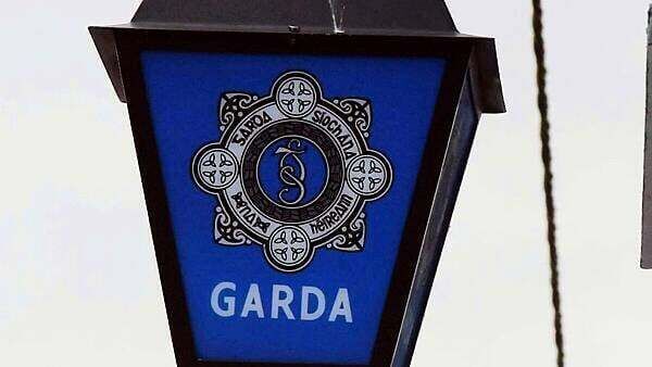 Woman (30s) charged in relation to online threats against Tánaiste