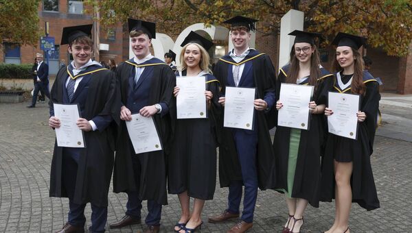 Darragh Humpston, Tarmonbarry; Eoin Quinn, Mullingar; Anna Lee, Donabate, Dublin; Conor Clarke, Malahide, with Caoimhe Duignan, Swords, and Orlaith Quinn, Duleek who received a BSc Data Science during the October graduation celebrations in DCU. Pic: Kyran O’Brien/DCU Communications Events and Marketing Team.