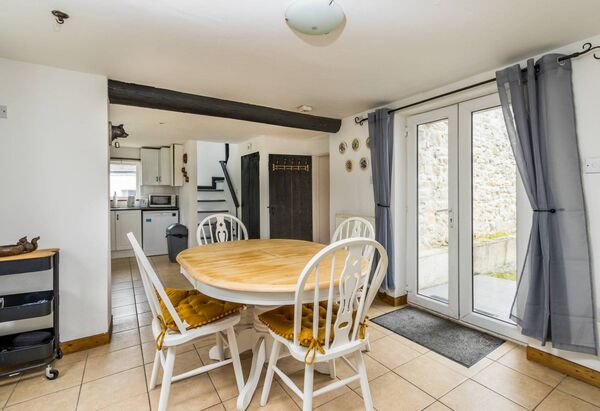 The house benefits from oil-fired central heating, tasteful interiors, and a bright, welcoming atmosphere throughout. 