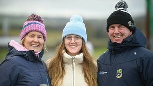 <p>Trish, Ella and Tom Killion supporting the St. Dominic's senior camogie team during their recent Connacht final against Killimor in Knockcroghery. Picture: Gerard O'Loughlin</p>