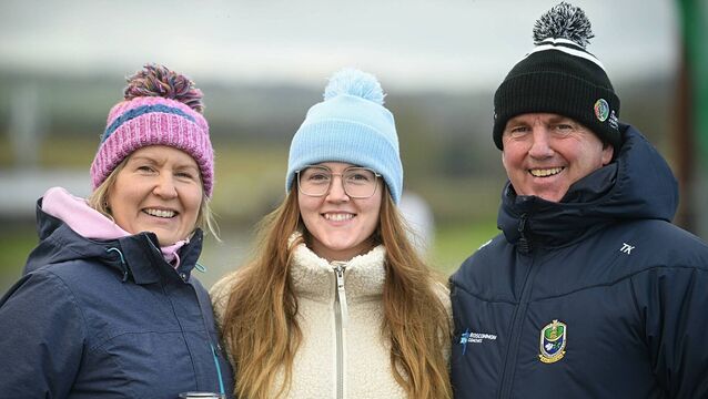 <p>Trish, Ella and Tom Killion supporting the St. Dominic's senior camogie team during their recent Connacht final against Killimor in Knockcroghery. Picture: Gerard O'Loughlin</p>