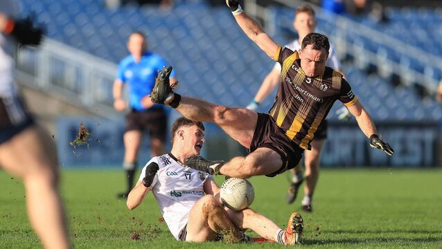 <p>TAKING A TUMBLE: Strokestown defender, David Neary, loses his footing under the challenge of Kilmeena's Liam Moore during Sunday's Connacht club intermediate football final at Hastings Insurance MacHale Park, Castlebar. Picture: Bernie O'Farrell</p>