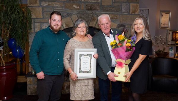 Veronica Smith pictured with her family at her retirement party - Cyril Og, Veronica, Cyril, and Catherine. Veronica Smith pictured with her family at her retirement party - Cyril Og, Veronica, Cyril, and Catherine.