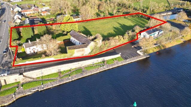 <p>The property is set within about two acres of mature private grounds. </p>