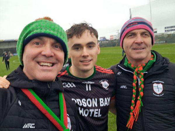 Player of the Match Conor Hand with his proud uncles, Brian and Tom Lennon, following Sunday's famous victory in the Hyde. Player of the Match Conor Hand with his proud uncles, Brian and Tom Lennon, following Sunday's famous victory in the Hyde.