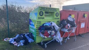 <p>Some of the dumping taking place at the clothes bank at Centrepoint Retail Park in Roscommon Town. Pic: Roscommon Tidy Towns</p>