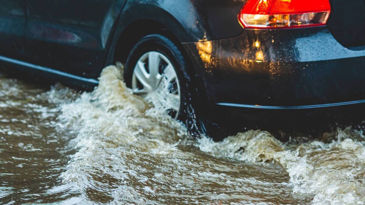 Car caught in floodwater