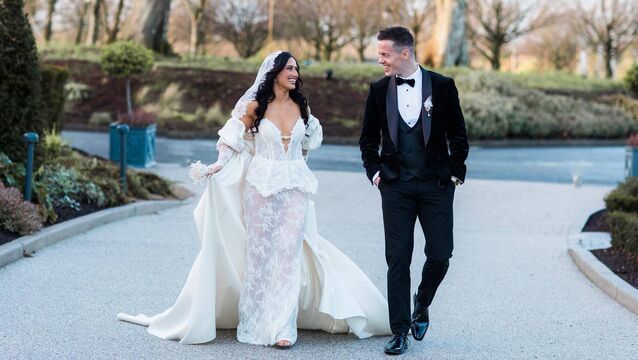 <p>Charlotte Cooney and Stephen Coen following their wedding on Friday. Charlotte is wearing a dress designed by herself and handmade by her mother, Pamela.</p>