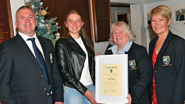 <p>Lady Captain, Una Clay, presents honorary life membership of Roscommon Golf Club to Olivia Costello. Also pictured are Captain Padraic Cuddy and President Marie McManus. Picture: Gerard O’Loughlin</p>